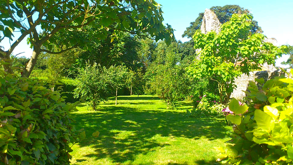 The cloisters gardens at Abbey Farm Cottages